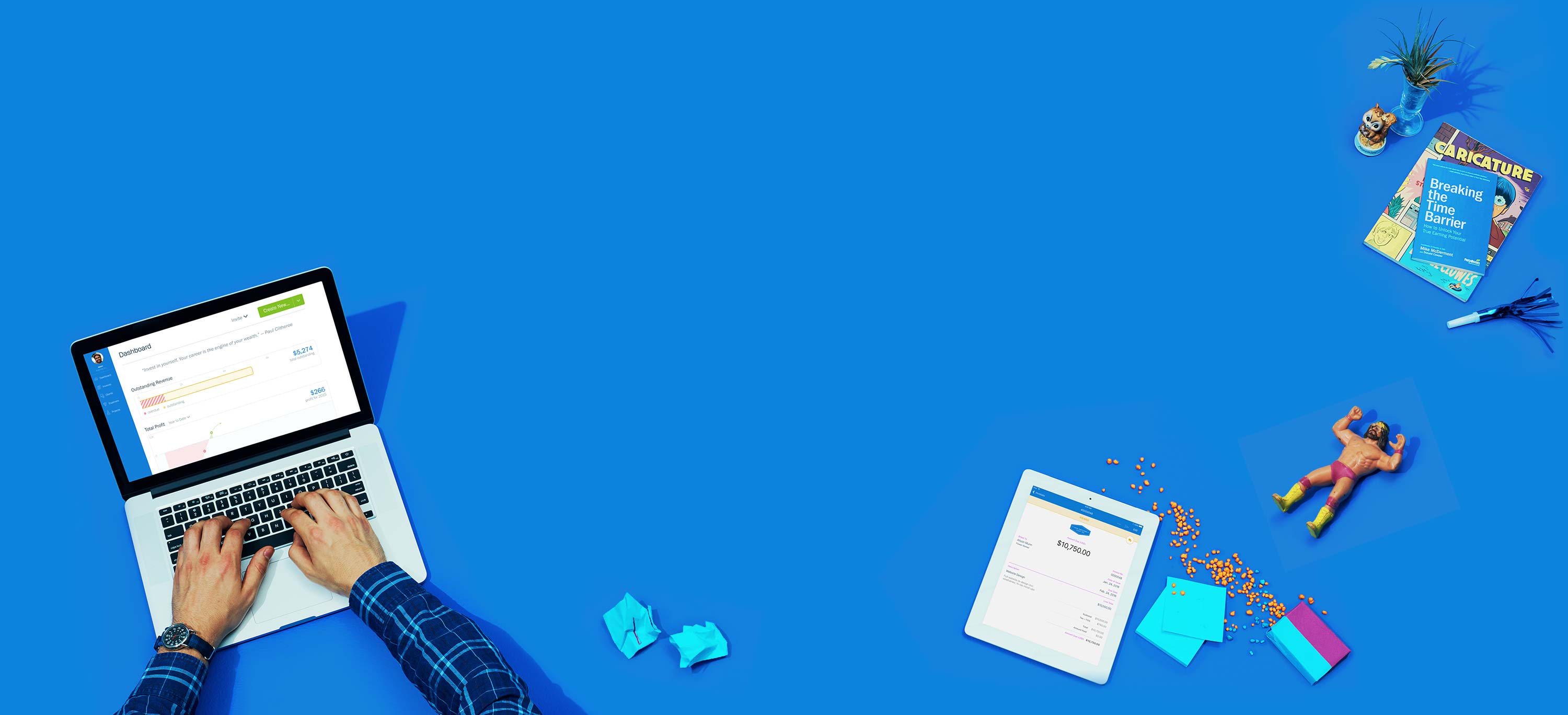 Small Business Accounting Software That Makes Billing Painless Small Business Owner Using FreshBooks on laptop and iPad